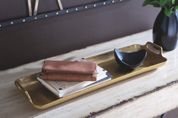 wholesale direct signature design by ashley posy decorative metal serving tray, gold finish bulk purchase at factory prices