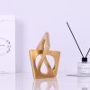 dropship from factory modern geometric sculpture gold knot statue decor, home gold bookcase centerpiece jax decorative, geometric tabletop sculpture and figurines, for golden home decor accent, cube decorative ornaments mass production supply