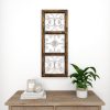 bulk purchase deco 79 wood scroll home wall decor window inspired wall sculpture with metal scrollwork relief, wall art 14" x 1" x 36", brown trade price